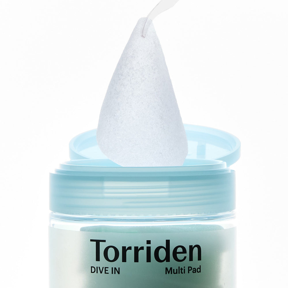 Torriden multi pad with a white applicator on a white background