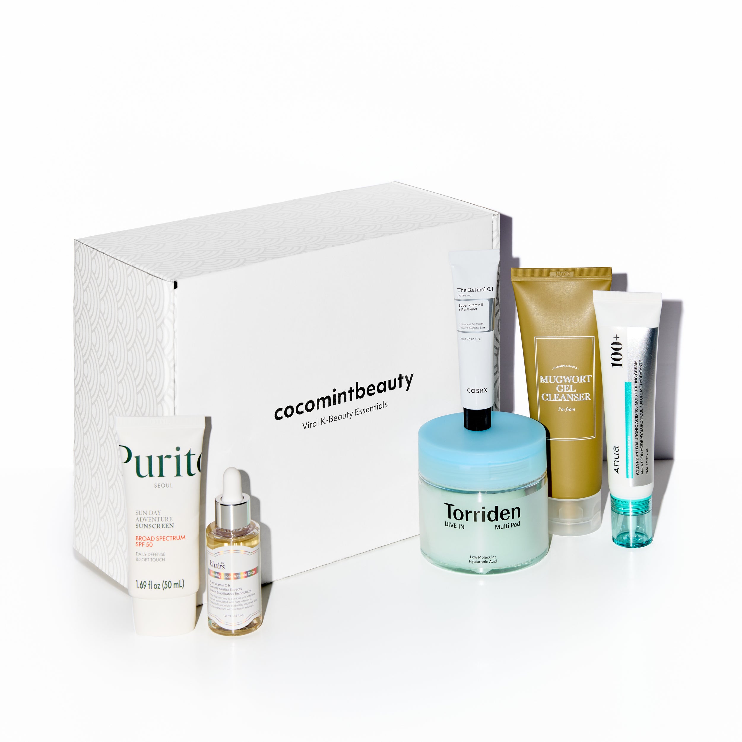 Collection of skincare products from cocomintbeauty on a white background