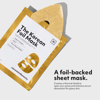 Open sachet of Cocomint Beauty Korean face mask with collagen revealing the gold foil backing that traps body heat